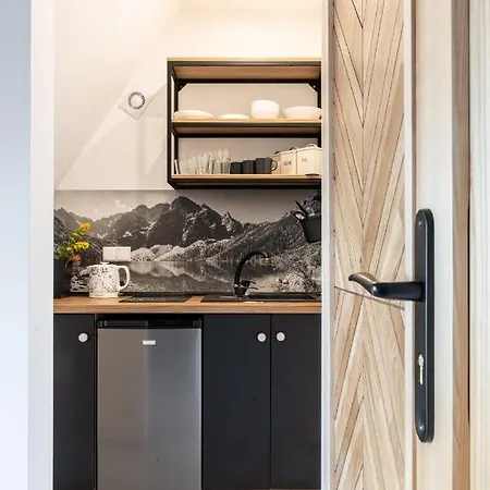 Goscinne Maryniarczyk *