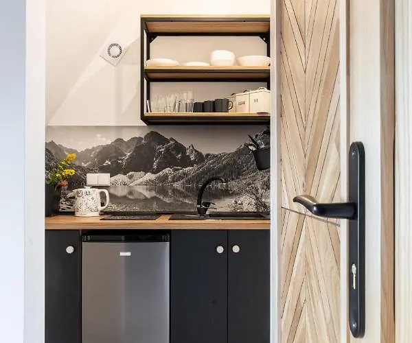 Goscinne Maryniarczyk *