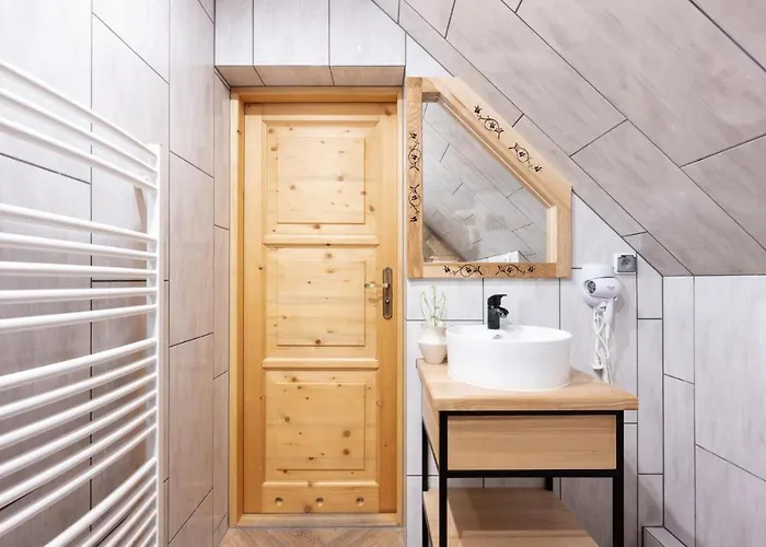 Goscinne Maryniarczyk *